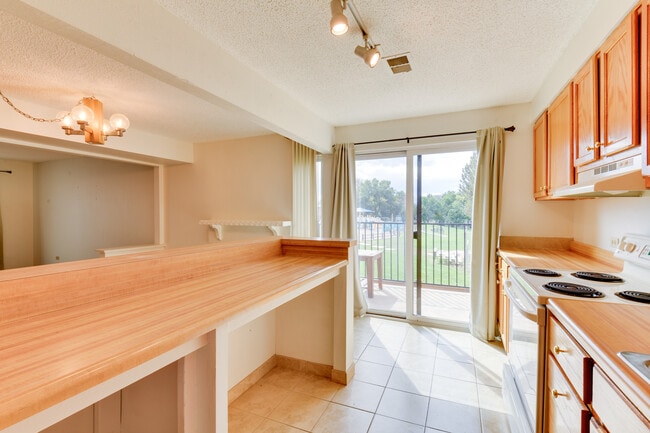 Kitchen and balcony - 2899 S Locust St