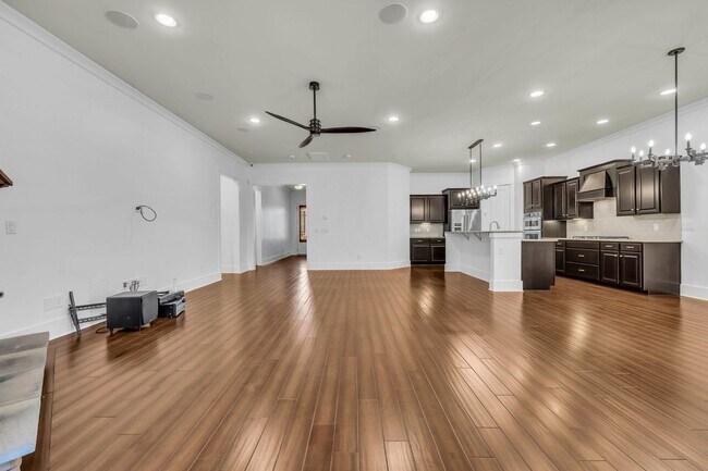 Building Photo - Beautifully maintained and move-in ready, this stunning mostly one-level all-brick home