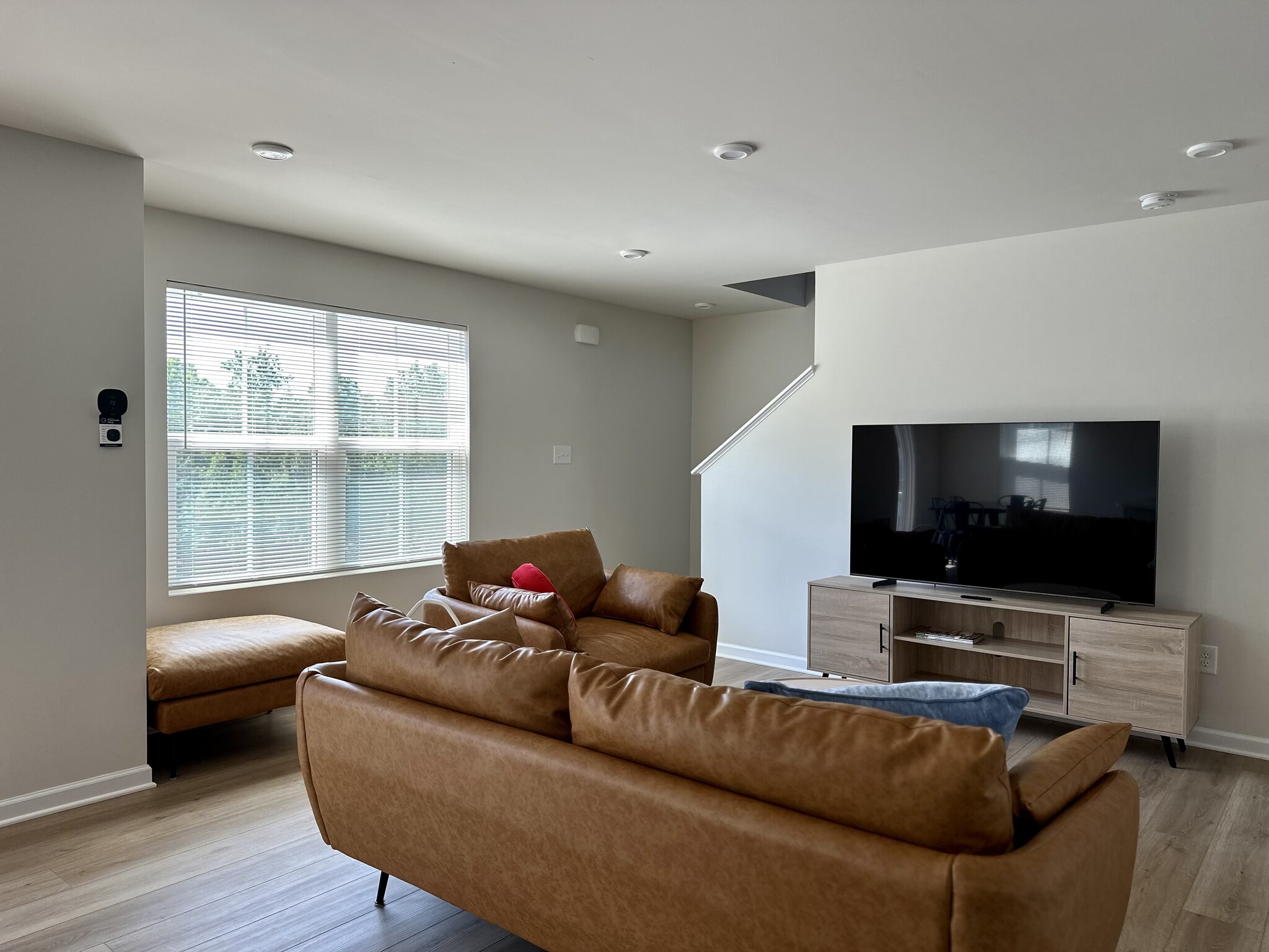 New leather sofas and 65’ Samsung TV - 149 Thicket Dr
