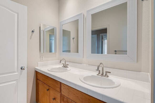 Building Photo - Gated corner lot home walking distance to the beach