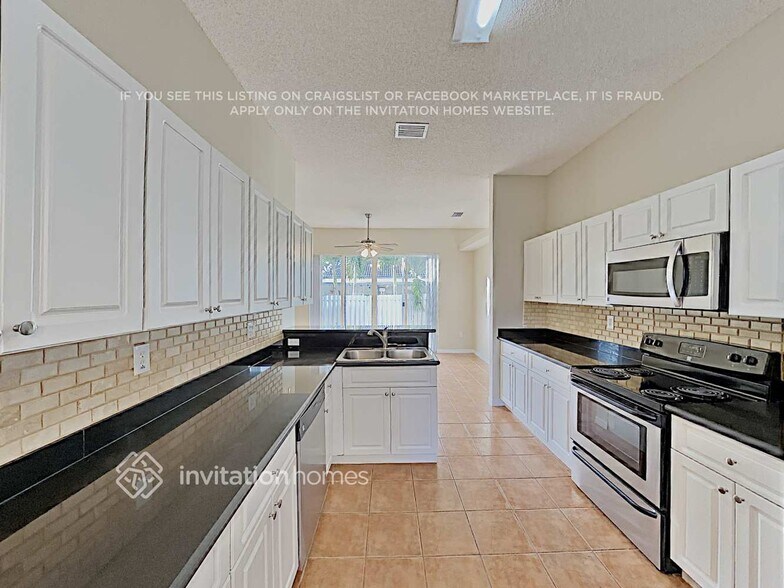 Building Photo - 10698 SW 20th Ct