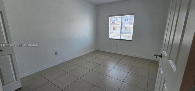 Building Photo - 5675 NW 109th Ave