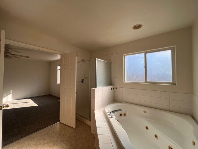 Building Photo - Large 4-bedroom home located in the Countr...