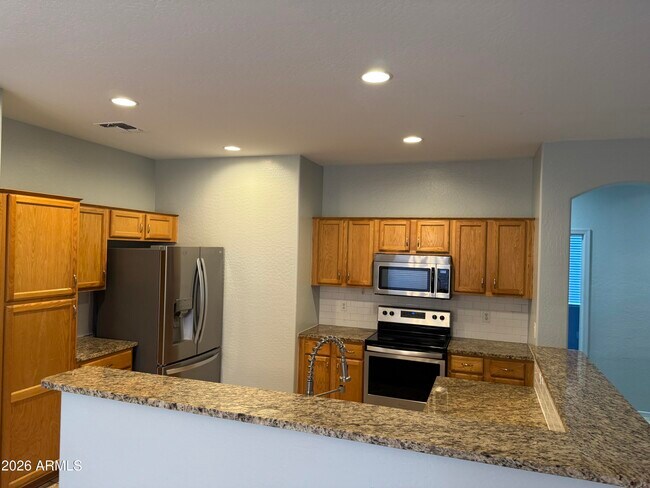 Building Photo - 11562 W La Reata Ave