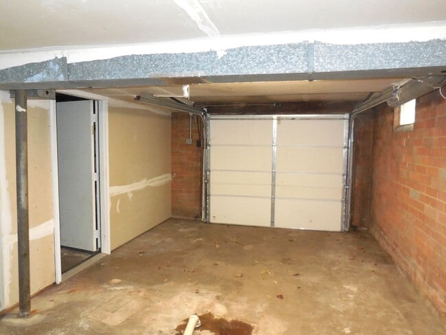 Building Photo - Two Bedroom House with Drive Under Garage!