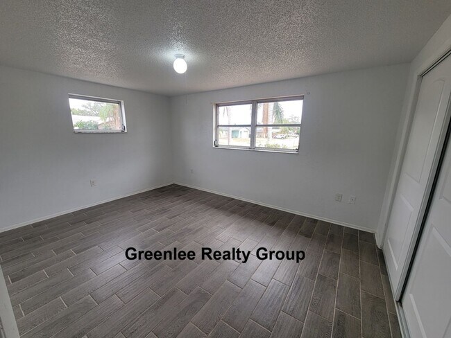 Building Photo - Updated & Spacious 3 Bedroom/2 Bath Home on a Corner Lot!