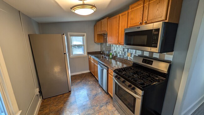 Kitchen with new appliances - 411 Lyman Ave