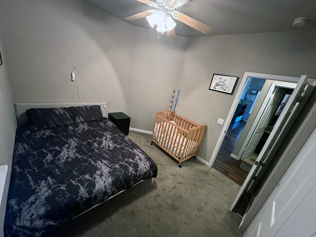 2nd Bedroom with baby crib - 9316 Caulfield Dr
