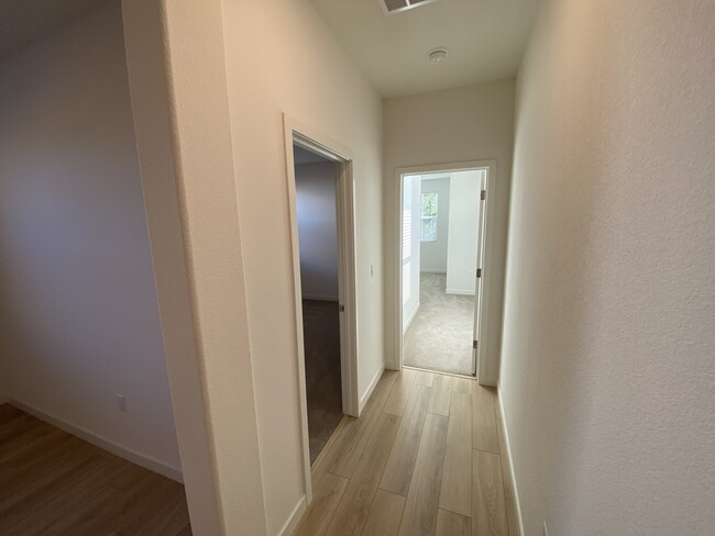 Hallway to Guest Rooms - 9895 Churchill Downs Dr