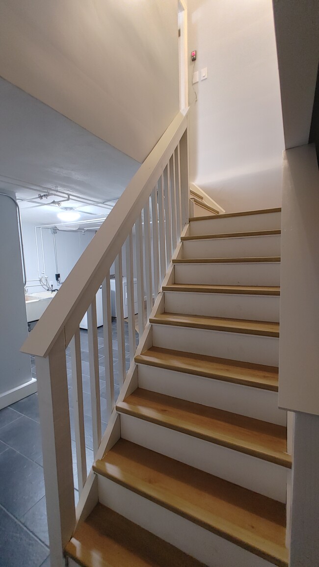 Stairs to 1200 SF finished basement - 6934 Winding Way