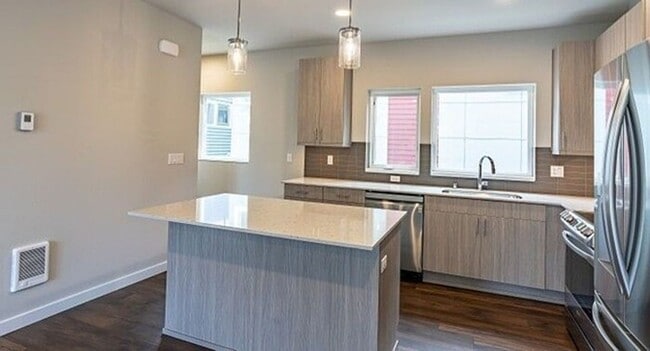 Building Photo - Brand New Pinehurst Home with Hardwood Floors & Easy I-5 Access