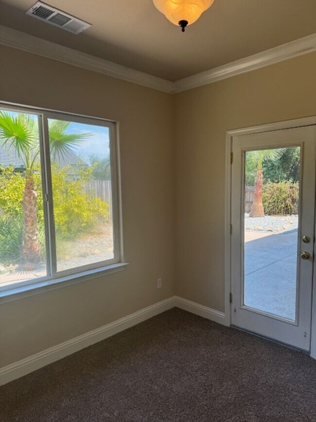 Building Photo - Enterprise Neighborhood 3 Bedroom Home with bonus room and 3 car garage- Landscaping Included!