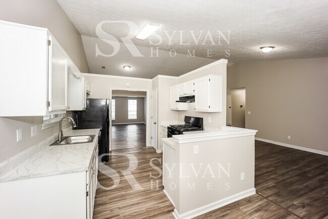 Building Photo - Feel right at home in this charming 3 bedr...