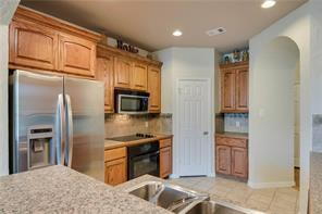 Building Photo - Former model home on corner lot is ready for move in!