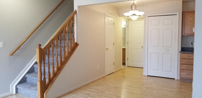 Building Photo - 2 Bedroom, 1.5 Bath Townhouse w/ Garage & Huge Master Bedroom. Full Sized Washer & Dryer In Unit.