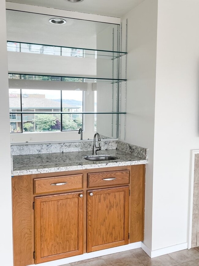 Building Photo - MARINER MANOR IS A PEACEFUL SOUND VIEW CONDO