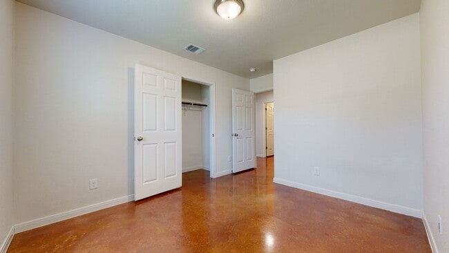 Building Photo - ALL STAINED CONCRETE FLOORING DUPLEX IN HA...