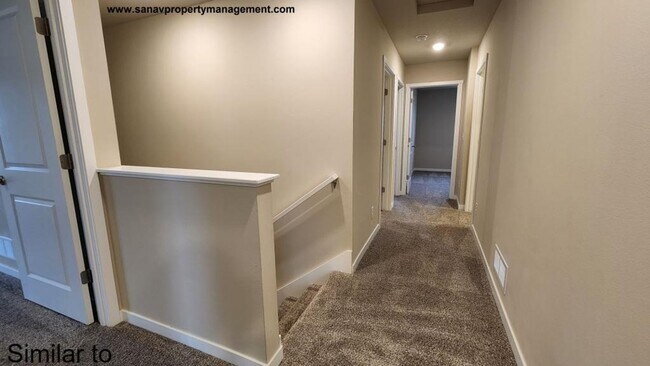 Building Photo - "Modern Luxury: Spacious 4-Bedroom Home with Open-Concept Design"