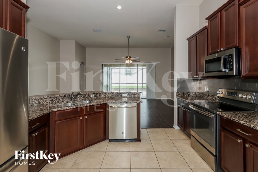 Building Photo - 8507 White Poplar Dr