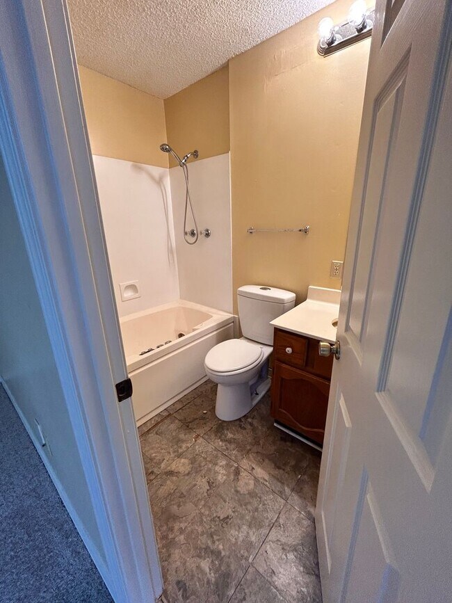 Building Photo - W/S/T included! Dbl garage! 2BR/2.5BA with...