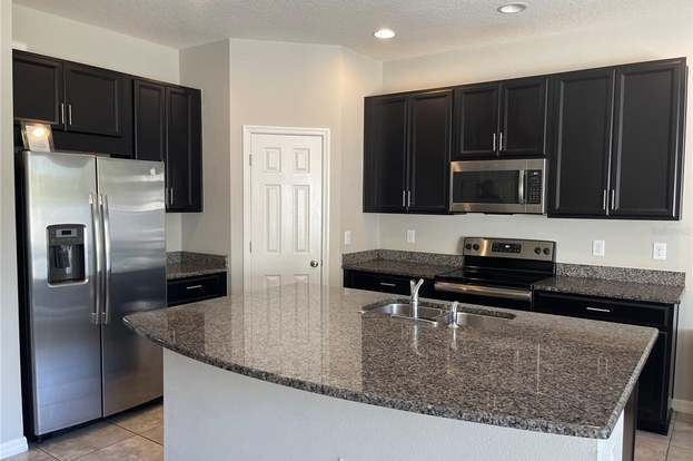 Building Photo - 7049 Summer Holly Pl