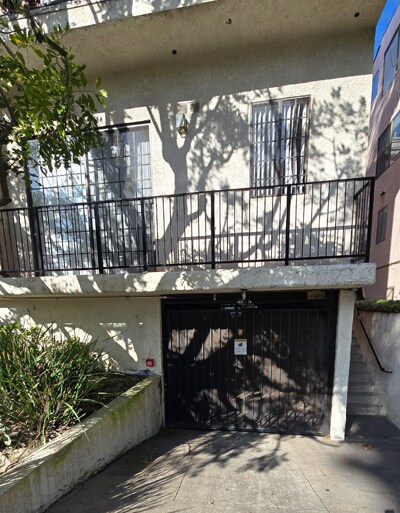 Balcony and Front Garage Door - 12821 Caswell Ave