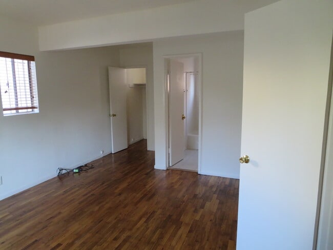 Bedroom showing bath and closet - 502 Indiana Ave