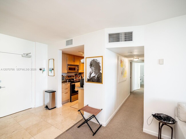Building Photo - 10275 Collins Ave