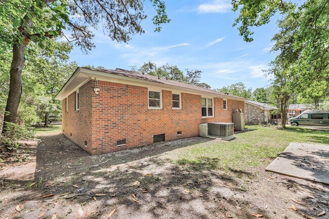 Building Photo - Solid Brick Home on Nearly Half an Acre — Space, Privacy & Charleston Convenience