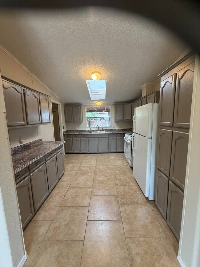 Building Photo - 6575 N Pelto Path