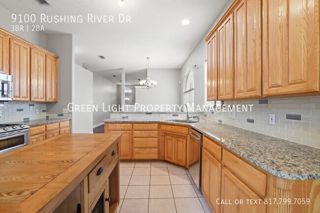 Building Photo - 9100 Rushing River Dr