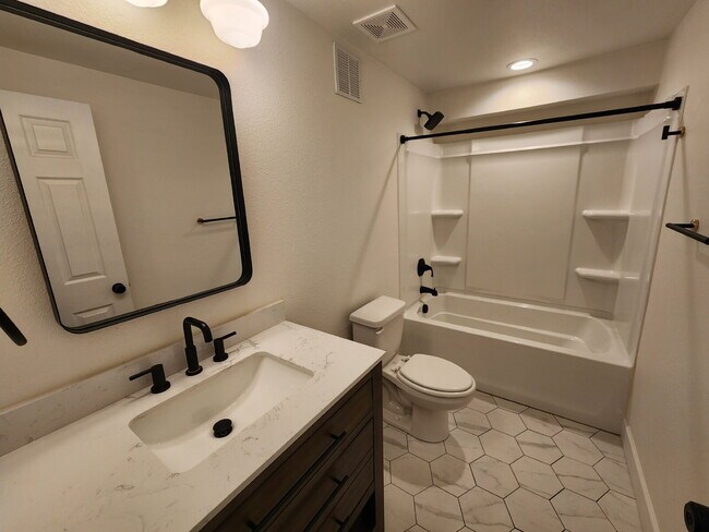 Building Photo - Spacious 5 Bed Home with Finished Basement, Multiple Living Areas & Private Backyard