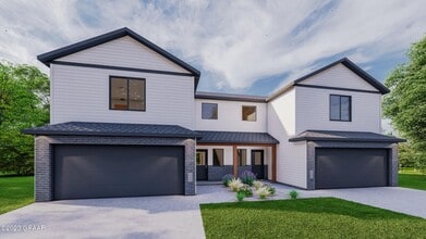 Building Photo - Modern 3-Bed Twinhome with Garage & Yard –...