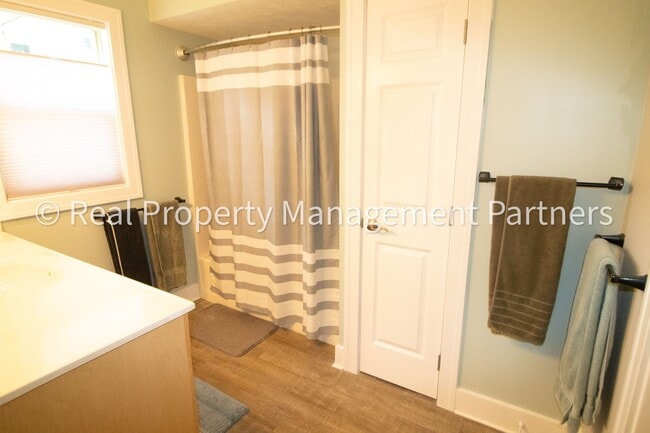 Building Photo - Spacious 3BR Townhome in Lowell | Nature Views & Maintenance-Free Living