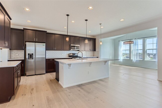 Building Photo - 3-Bedroom Home with Open Floor Plan, Private Balcony & Attached Garage