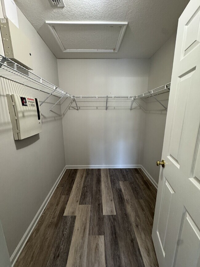 Building Photo - Spacious 4 Bedroom Pond-View Home with Upg...