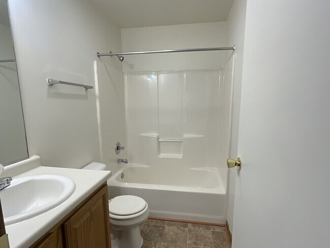 Building Photo - For Rent - 4 Bedroom, 2 Full Bath Home with Ground-Floor Bedroom, Attached Garage and Brand-New K...