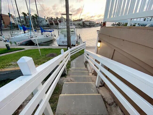 pool leading the the bay - 14300 S Padre Island Dr