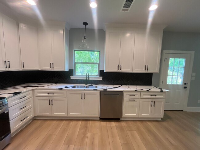 Building Photo - New construction mins from LRAFB