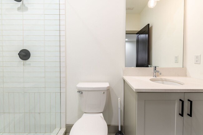 Building Photo - Modern Living Meets Walkable City Charm in...