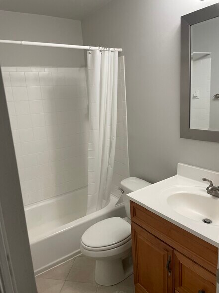 Shower curtain. New bathroom fixtures. - 7288 Beechtree Ln