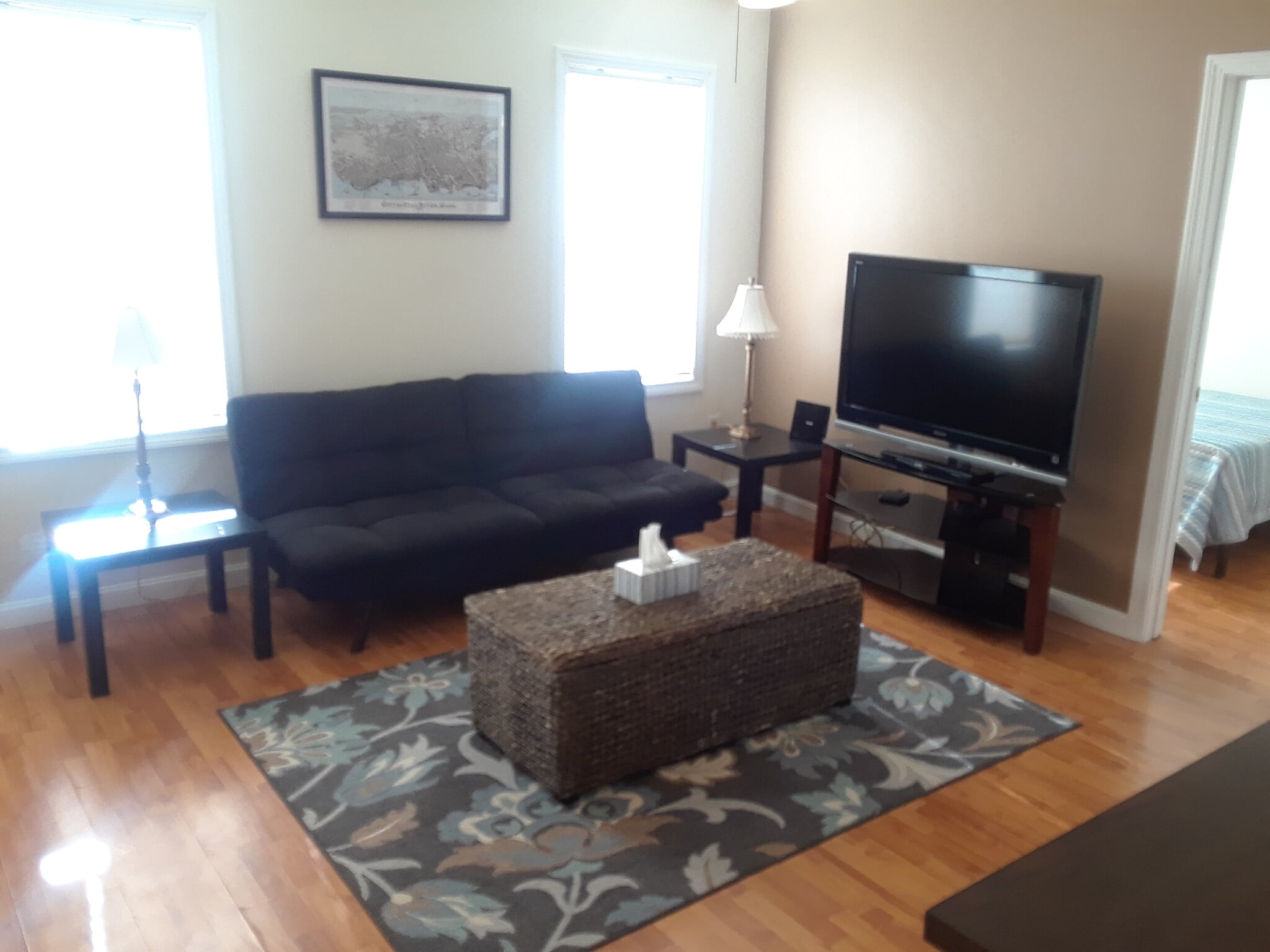 Living room with smart TV. - 56 Fulton St