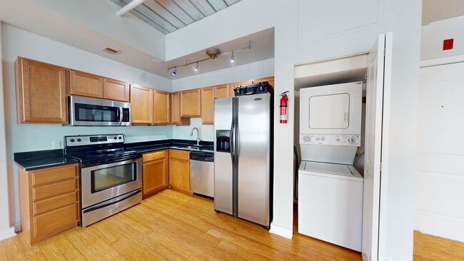 Building Photo - Modern 1 BR w/ SS appliances at The Lofts ...
