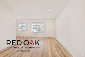 Building Photo - Bright and Airy Top Floor One Bedroom with...