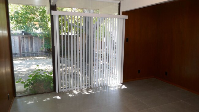 Building Photo - BEAUTIFUL UPDATED FOUR BED / TWO BATH PLUS OFFICE EICHLER HOME WITH GREAT OUTDOOR SPACE