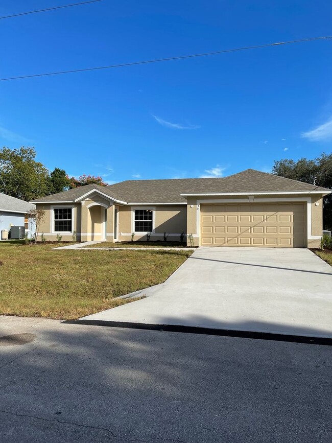 Building Photo - Like new 3/2/2 with screened in porch! Loc...