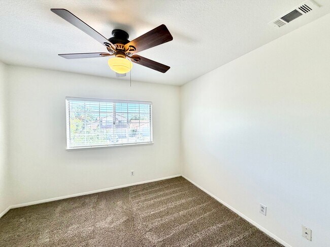 Building Photo - Spacious 5 Bedroom 3 Bathroom Home with Updated Paint, New Roof & Private Balcony