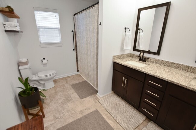 Building Photo - Pet Friendly Three Bedroom with Bonus!