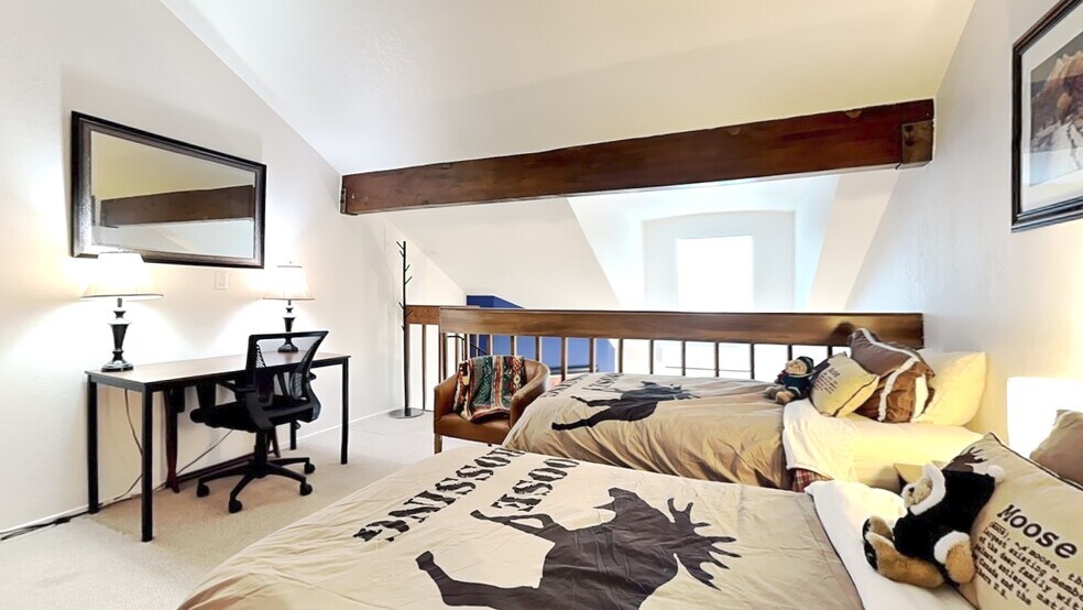 loft with desk, chair, two twin beds - 1530 Empire Ave