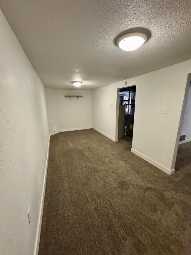 Building Photo - 2 Bedroom Home with Partially Finished Bas...